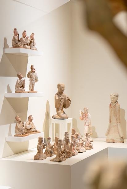 A shelf of figures from the collection